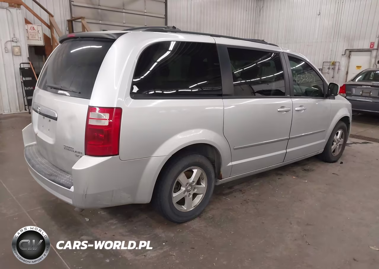 2010 Dodge Grand Caravan Sxt VIN:2D4RN5D10AR100389 - 4