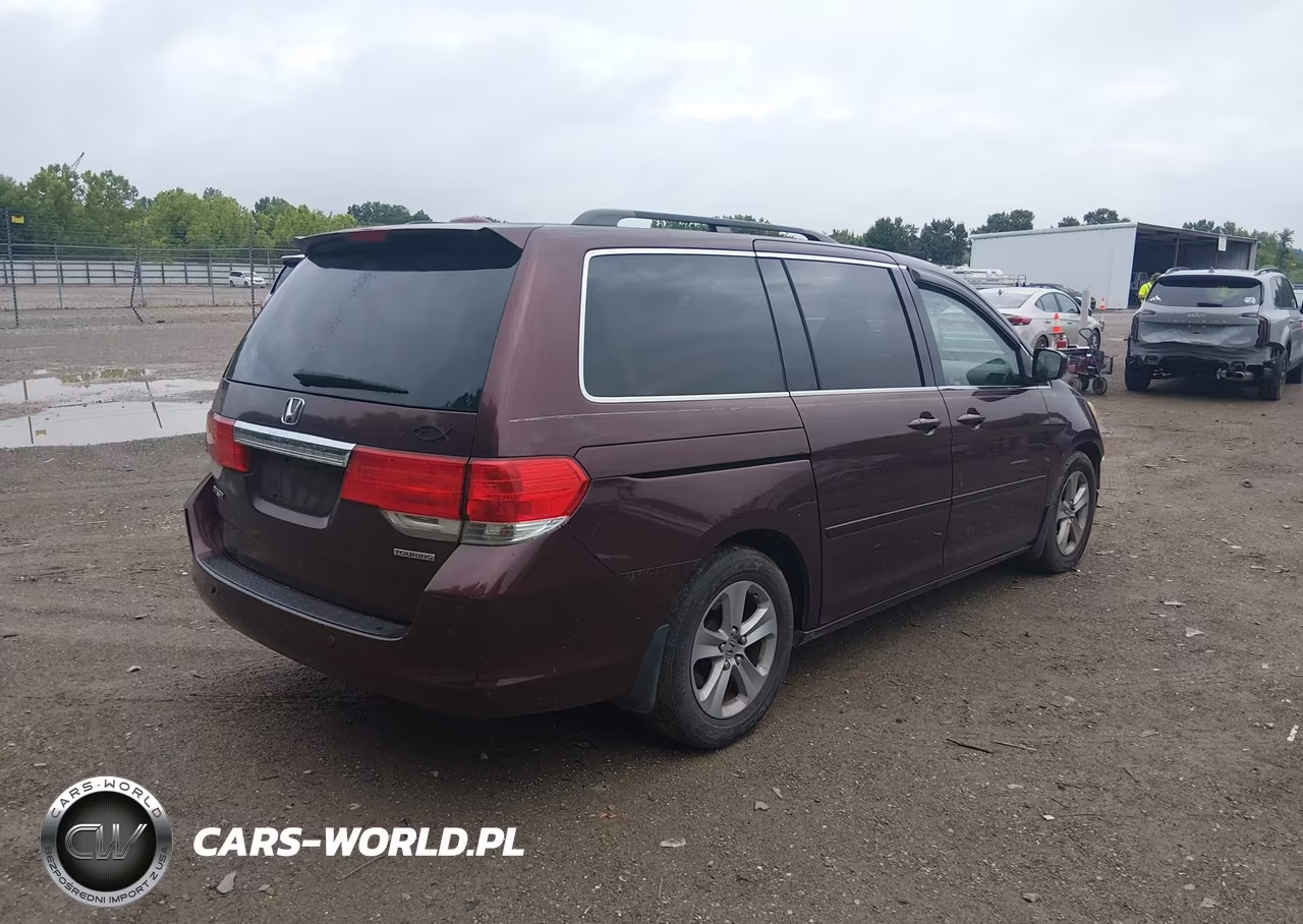 2010 Honda Odyssey Touring VIN:5FNRL3H96AB056661 - 4