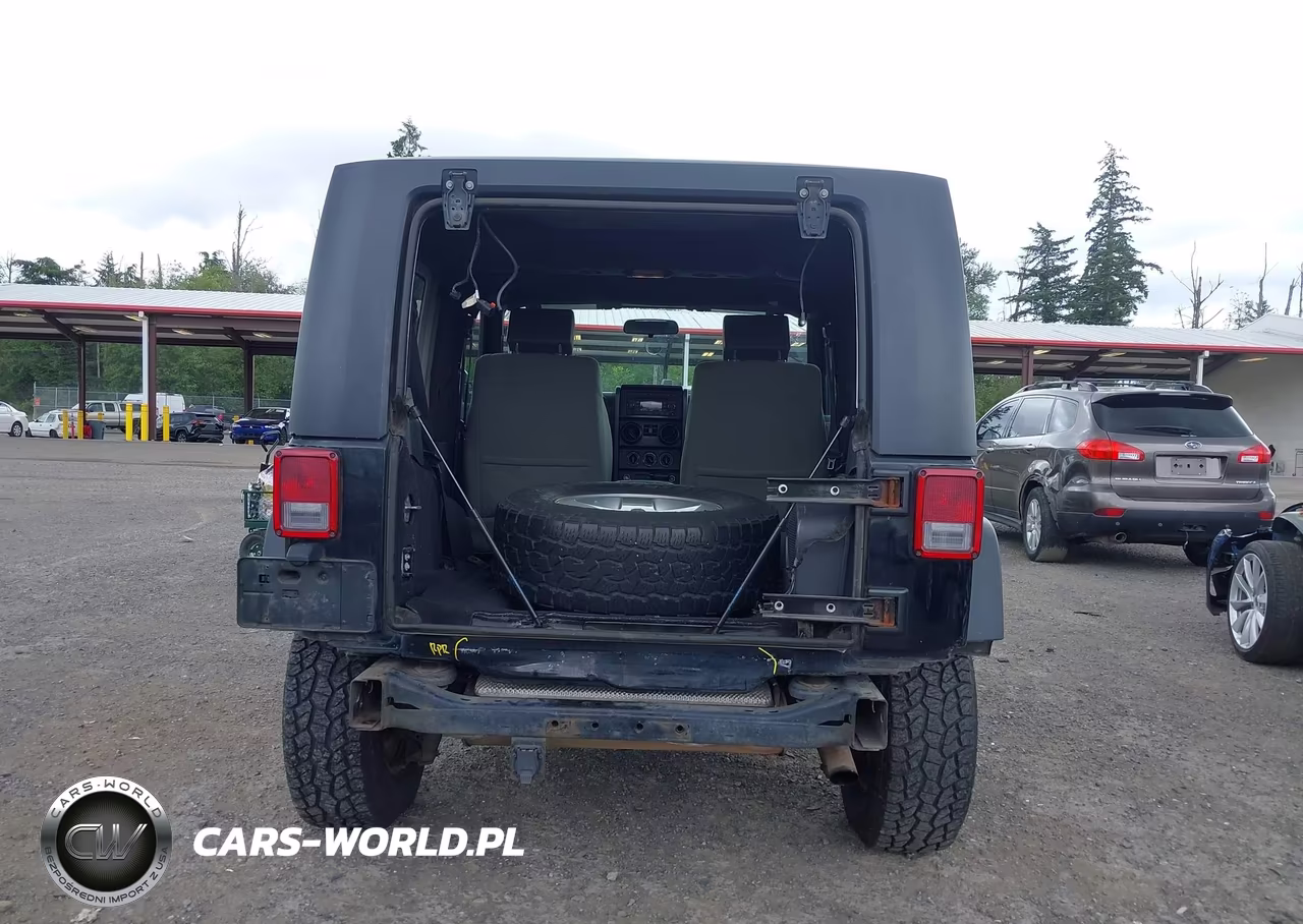 2010 Jeep Wrangler Sport VIN:1J4GA2D16AL204581 - 17