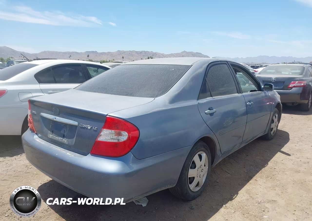 2002 Toyota Camry Le VIN:JTDBE32K220069270 - 4