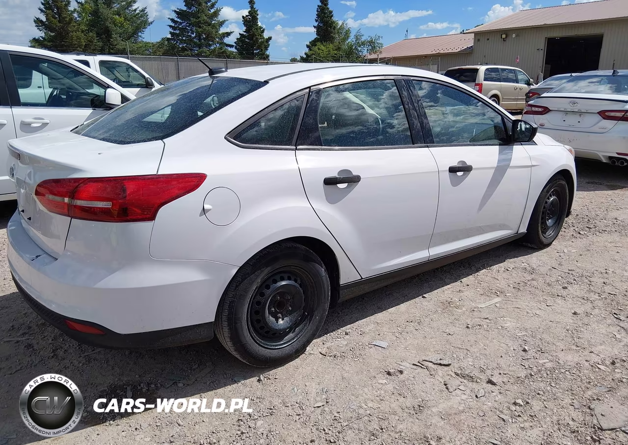 2017 Ford Focus S VIN:1FADP3E21HL283422 - 4