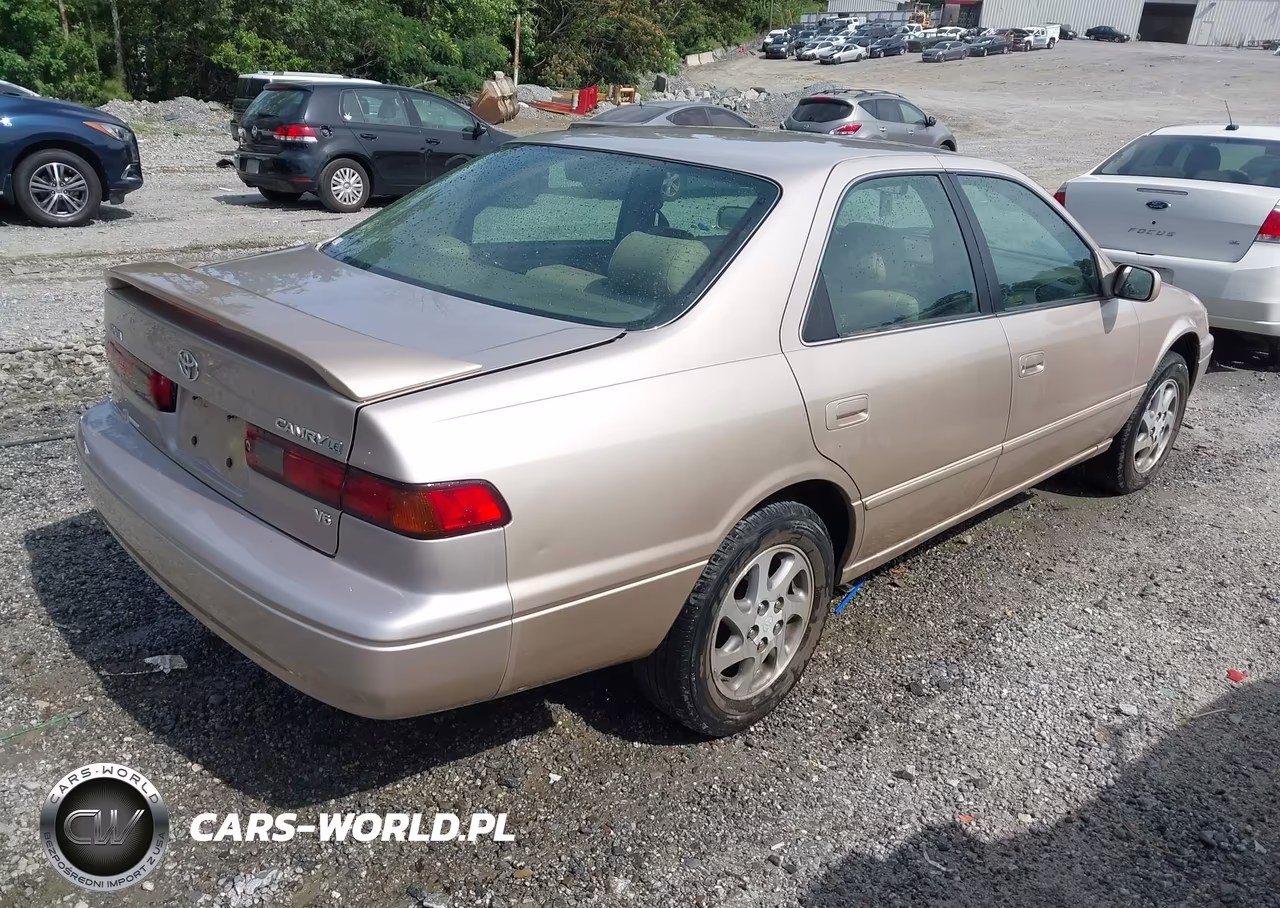 1999 Toyota Camry Le V6 VIN:4T1BF28K0XU076874 - 4
