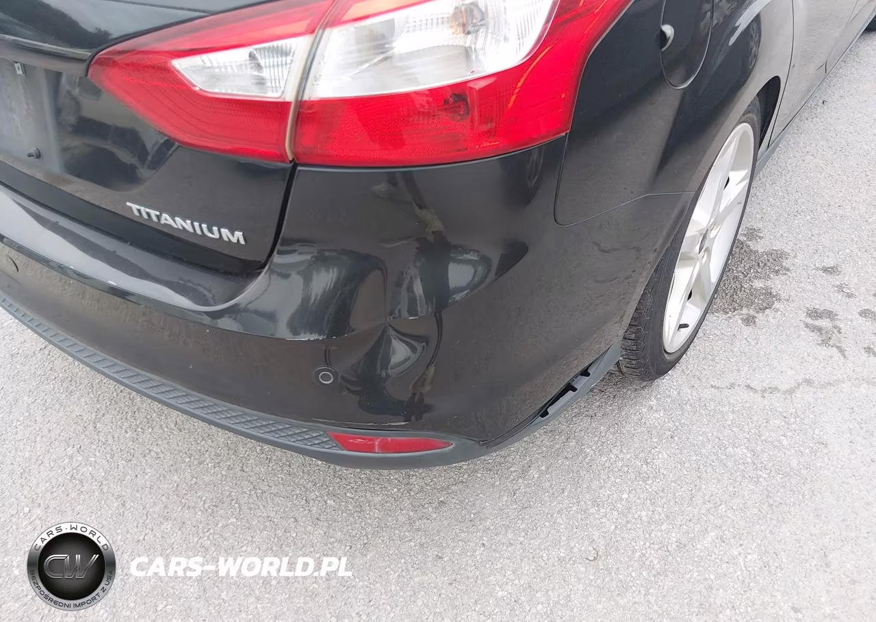 2014 Ford Focus Titanium VIN:1FADP3J24EL255230 - 6