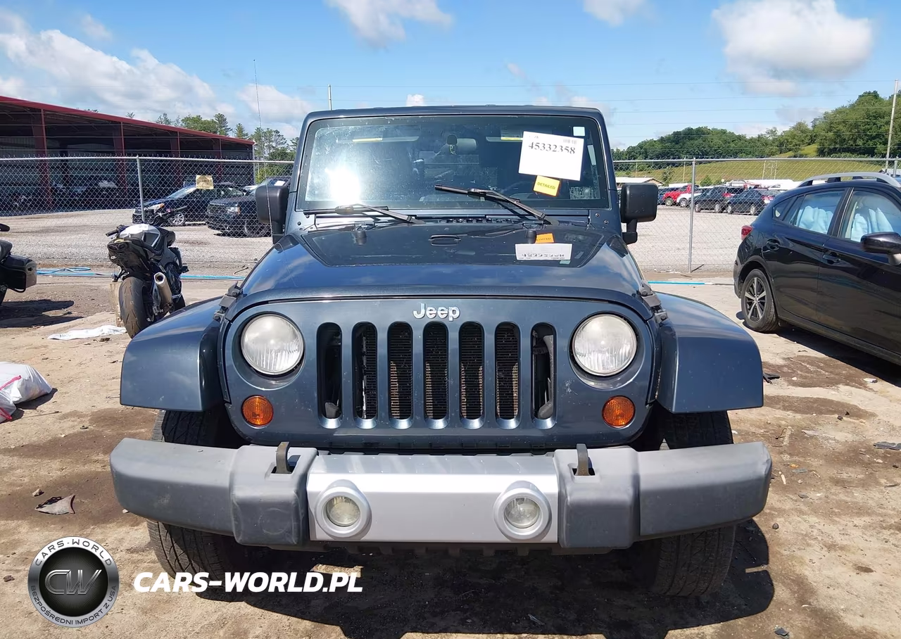 2008 Jeep Wrangler Unlimited Sahara VIN:1J4GA59198L520898 - 12