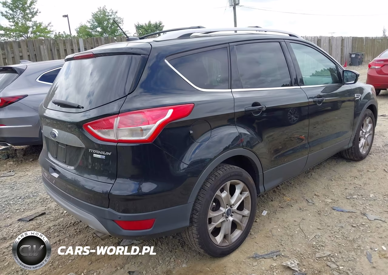 2016 Ford Escape Titanium VIN:1FMCU9JX2GUA17172 - 4