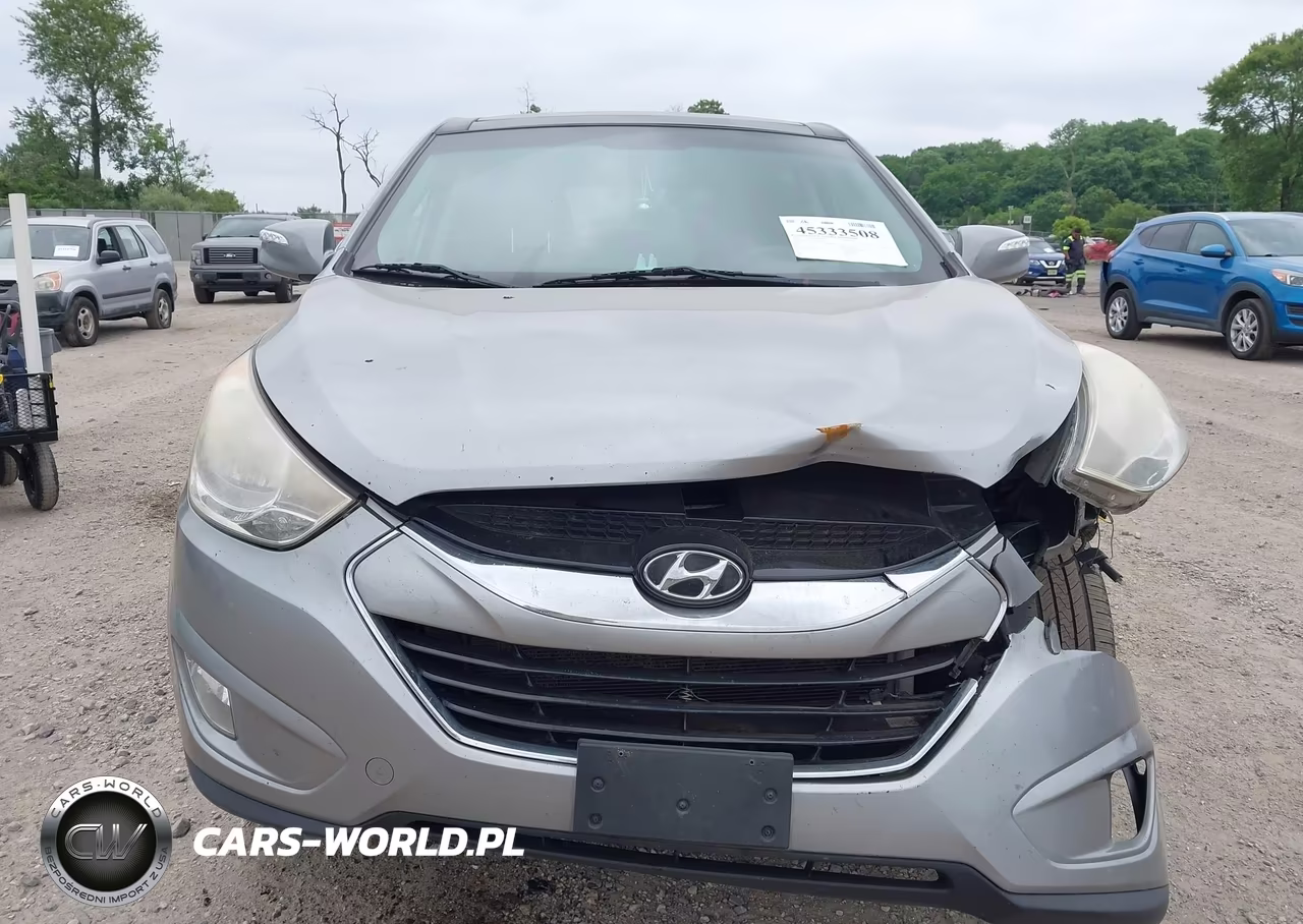 2012 Hyundai Tucson Limited VIN:KM8JU3AC6CU529934 - 12