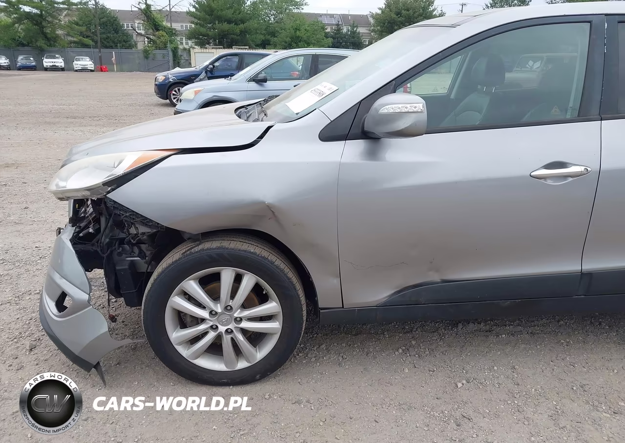2012 Hyundai Tucson Limited VIN:KM8JU3AC6CU529934 - 6