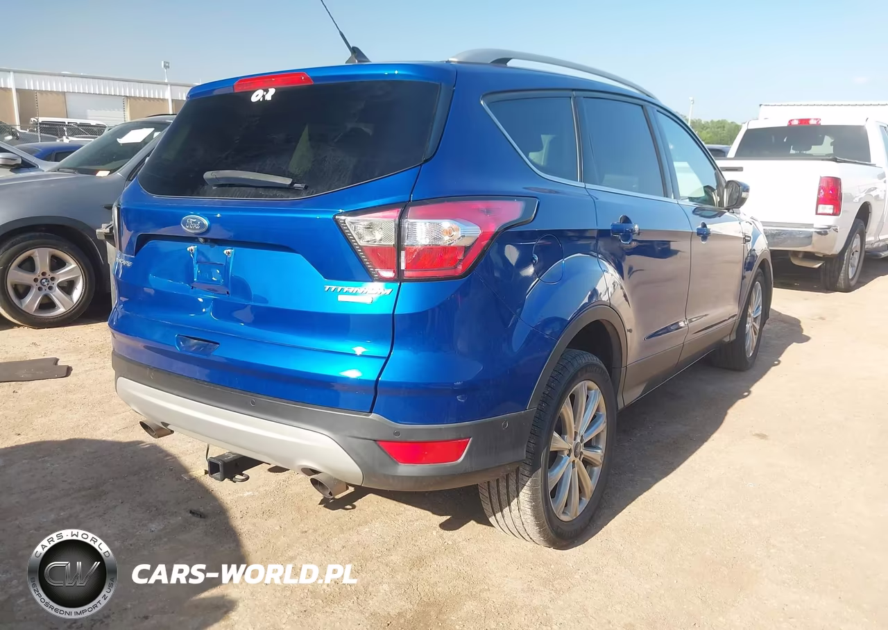 2018 Ford Escape Titanium VIN:1FMCU0J92JUC07610 - 4