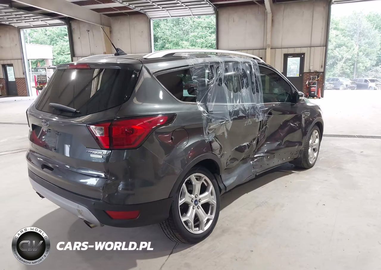 2019 Ford Escape Titanium VIN:1FMCU0J91KUA10607 - 4