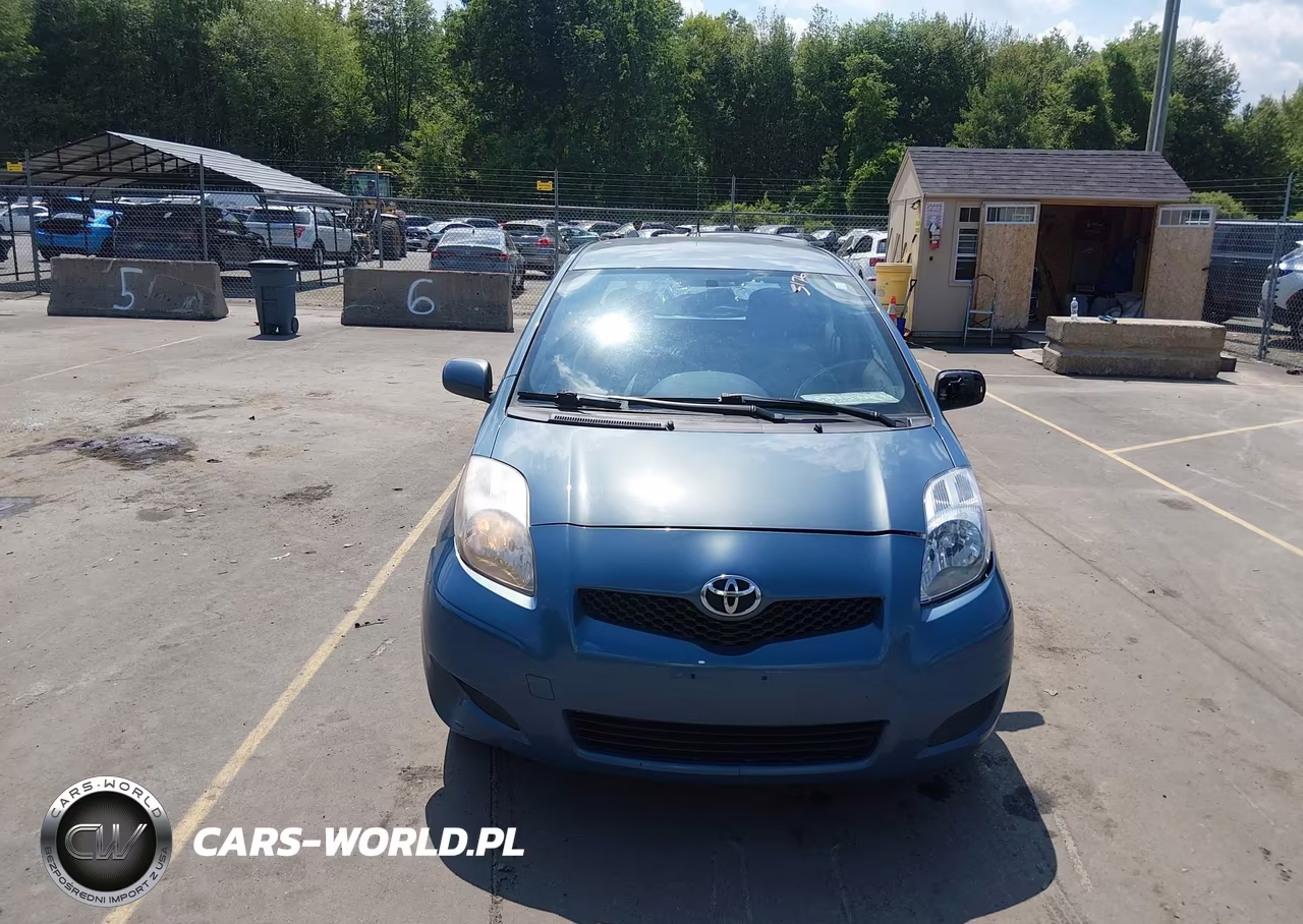 2009 Toyota Yaris VIN:JTDKT903095232192 - 13