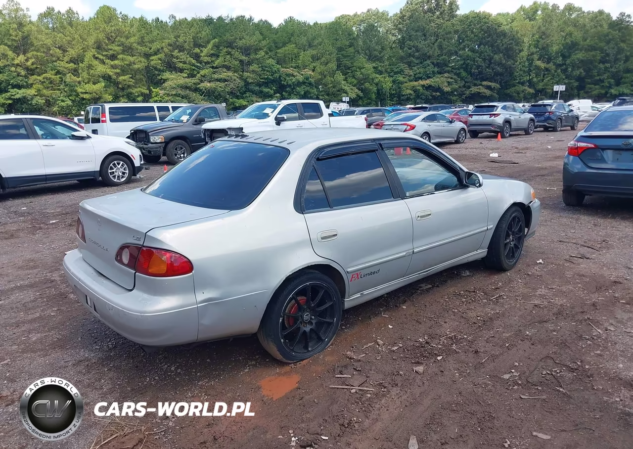 2002 Toyota Corolla Le VIN:1NXBR12E02Z639676 - 4
