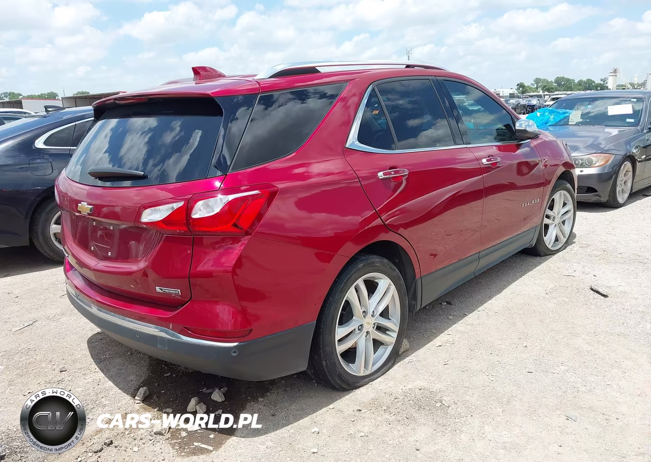 2018 Chevrolet Equinox Premier VIN:2GNAXMEV6J6129145 - 4