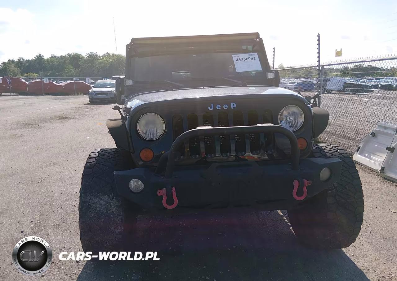 2012 Jeep Wrangler Unlimited Sahara VIN:1C4BJWEG2CL227935 - 13