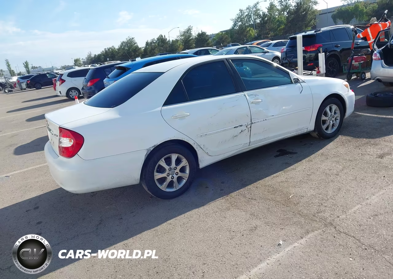 2004 Toyota Camry Le VIN:JTDBE32K440265116 - 4