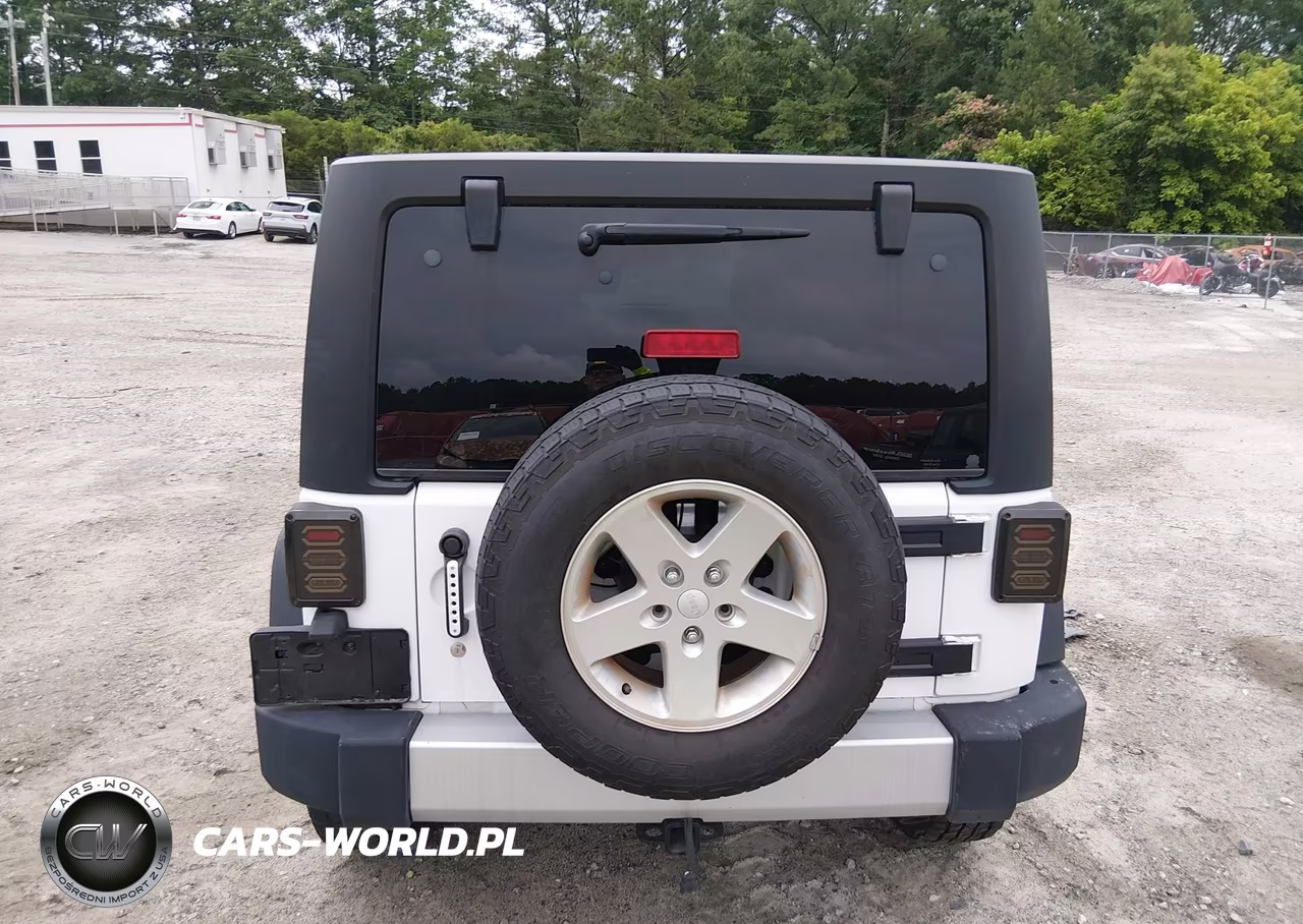 2013 Jeep Wrangler Unlimited Sport VIN:1C4HJWDG3DL502158 - 16