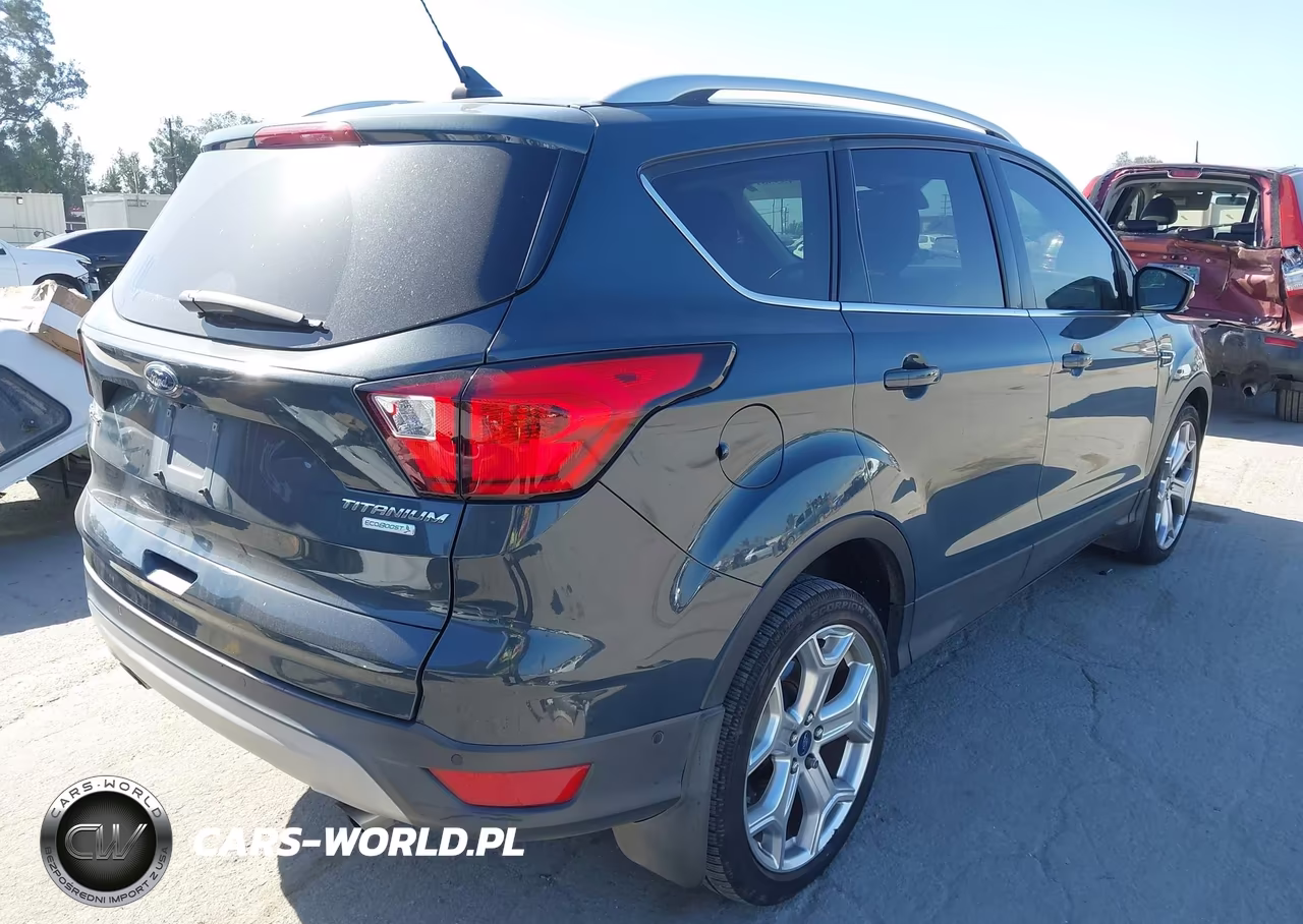 2019 Ford Escape Titanium VIN:1FMCU0J95KUA63939 - 4