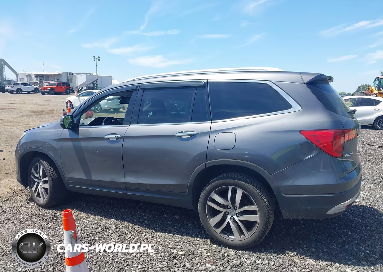 2016 Honda Pilot Touring VIN:5FNYF6H95GB065784 - 14