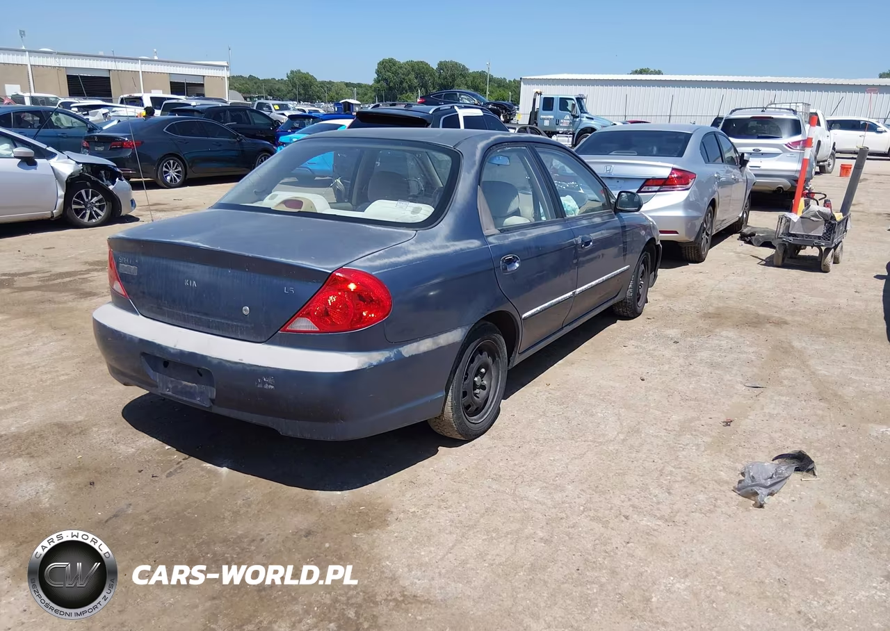 2002 Kia Spectra Ls VIN:KNAFB121725199647 - 4