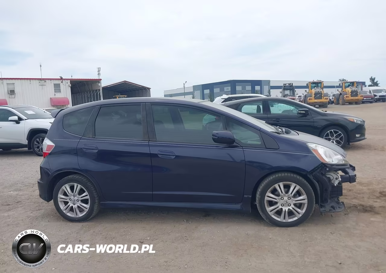 2009 Honda Fit Sport VIN:JHMGE884X9S065721 - 14