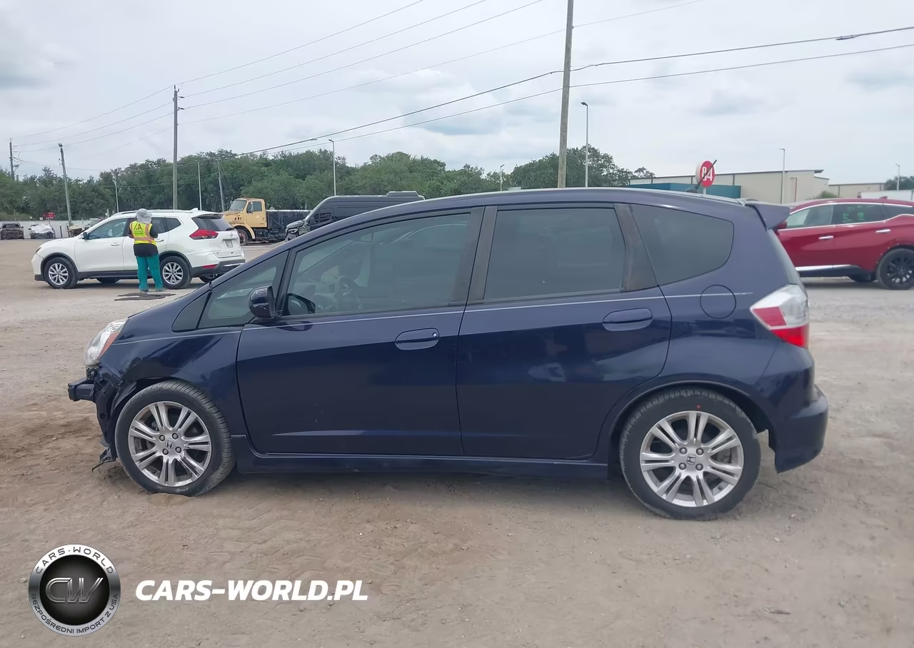 2009 Honda Fit Sport VIN:JHMGE884X9S065721 - 15