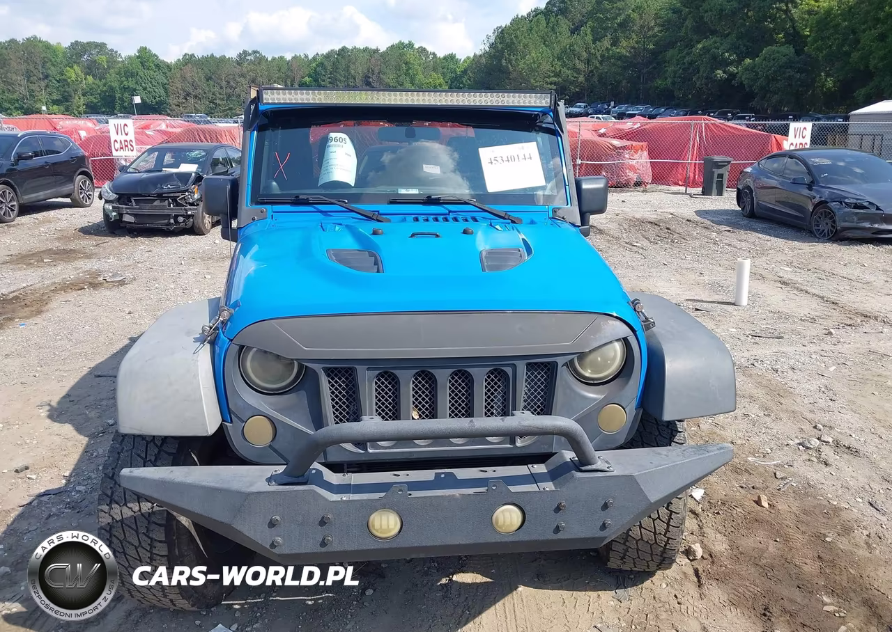 2012 Jeep Wrangler Sport VIN:1C4AJWAG4CL144105 - 12