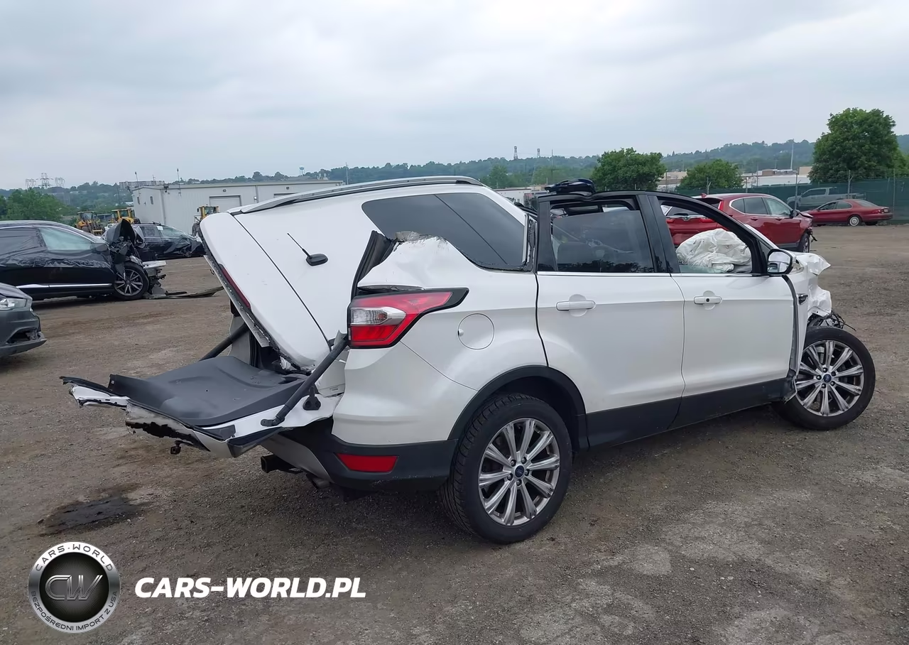 2017 Ford Escape Titanium VIN:1FMCU9JD1HUE42034 - 4