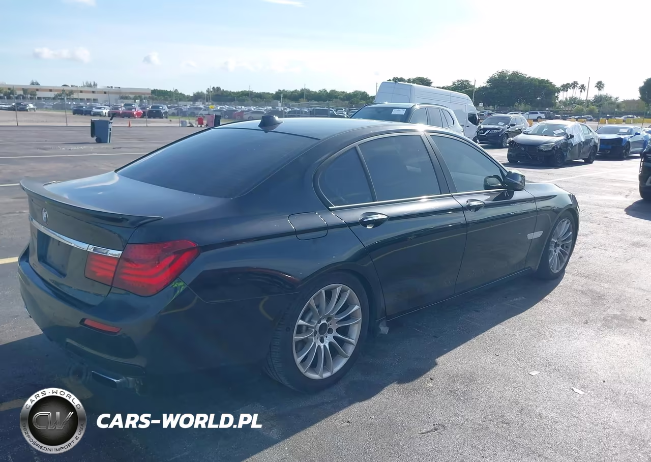 2015 BMW 740I VIN:WBAYA6C5XFD827089 - 4