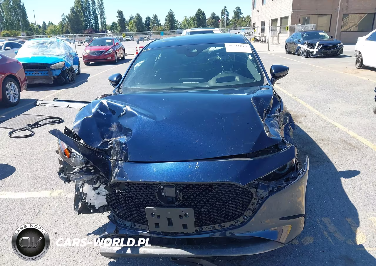 2019 Mazda Mazda3 Premium Package VIN:JM1BPBNM0K1144415 - 13