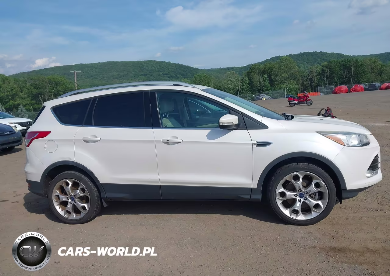 2016 Ford Escape Titanium VIN:1FMCU9JX8GUB10004 - 13