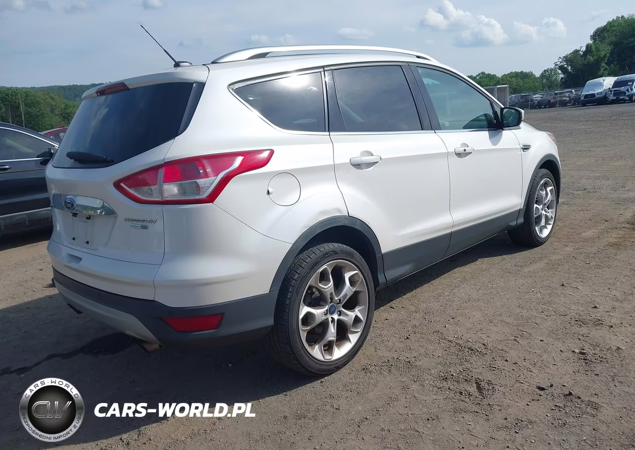 2016 Ford Escape Titanium VIN:1FMCU9JX8GUB10004 - 4