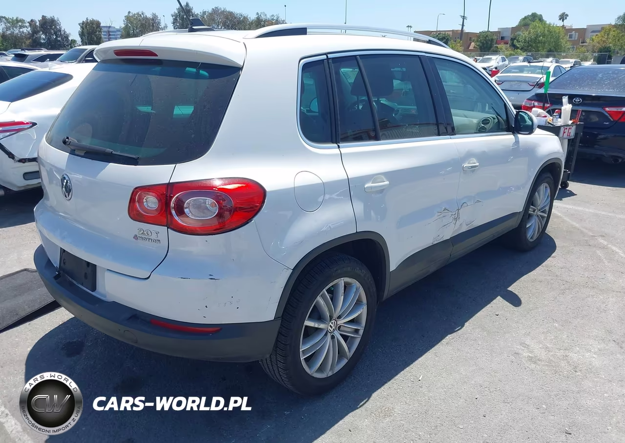 2011 Volkswagen Tiguan Sel VIN:WVGBV7AX6BW534596 - 4