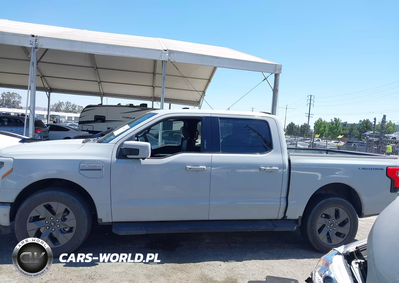 2023 Ford F-150 Lightning Lariat VIN:1FT6W1EV2PWG56579 - 14