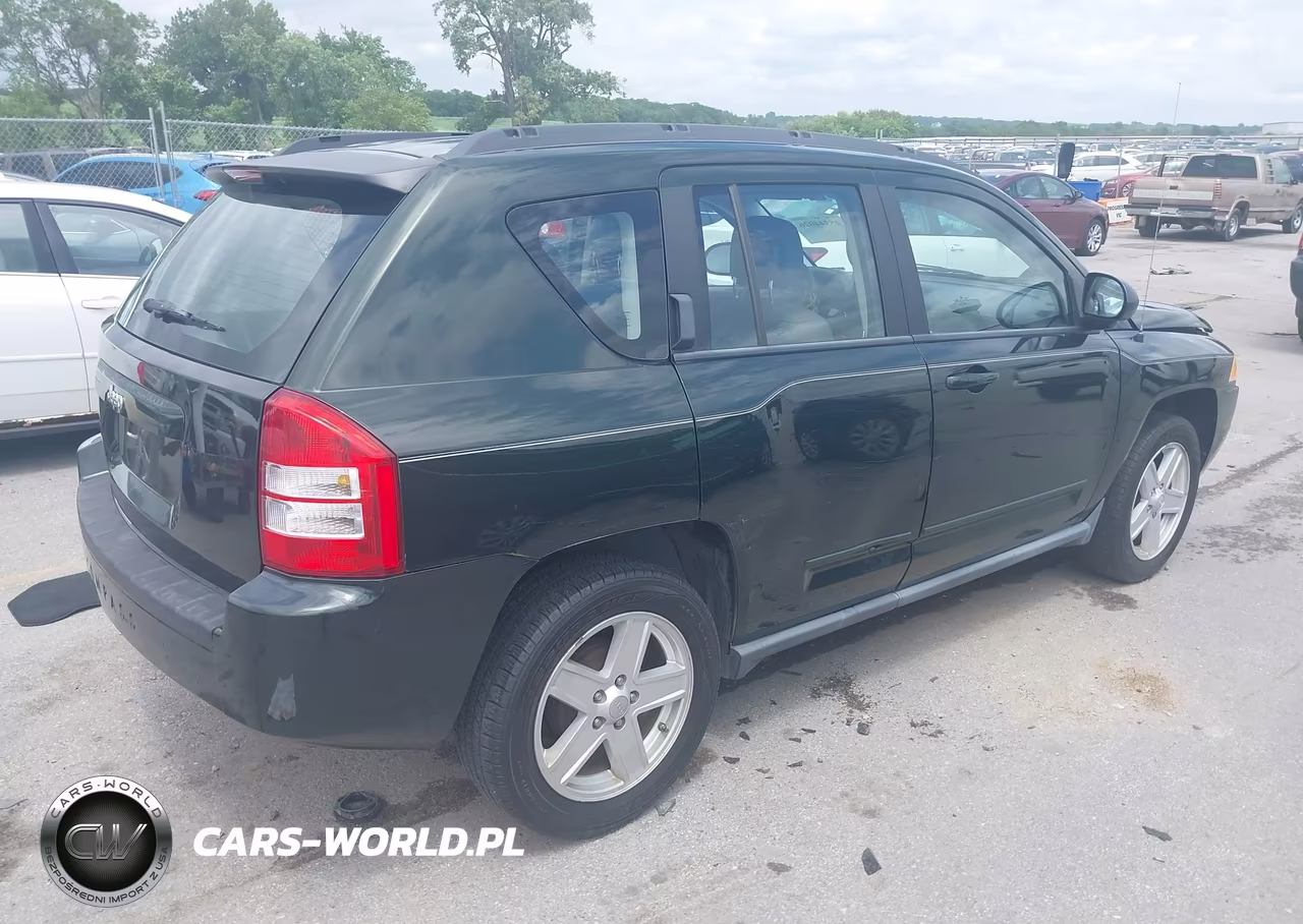 2010 Jeep Compass Sport VIN:1J4NT4FB1AD612242 - 4