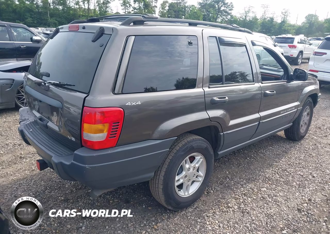 1999 Jeep Grand Cherokee Laredo VIN:1J4GW58N8XC623167 - 4