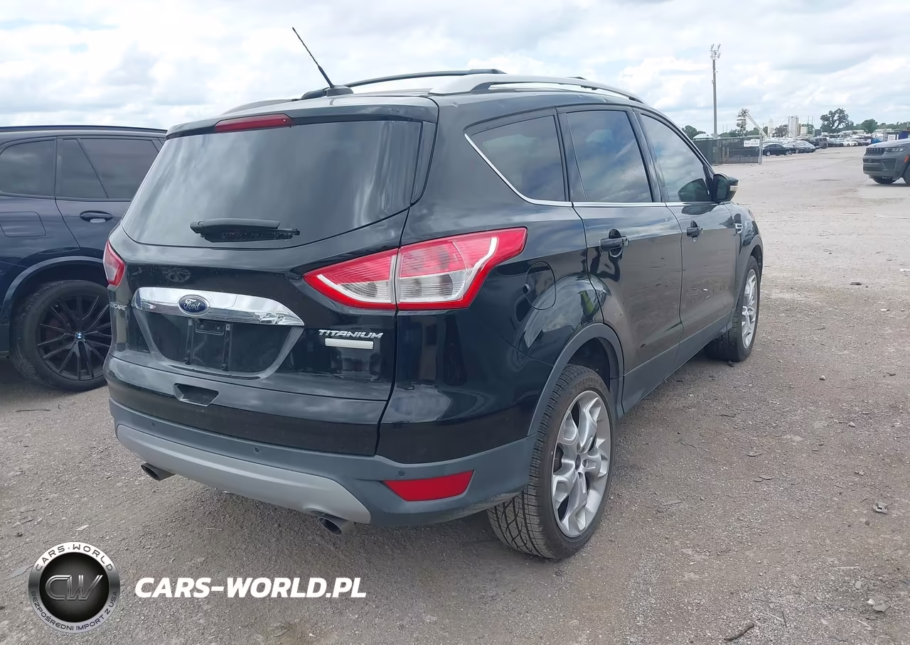 2016 Ford Escape Titanium VIN:1FMCU0J9XGUC41318 - 4