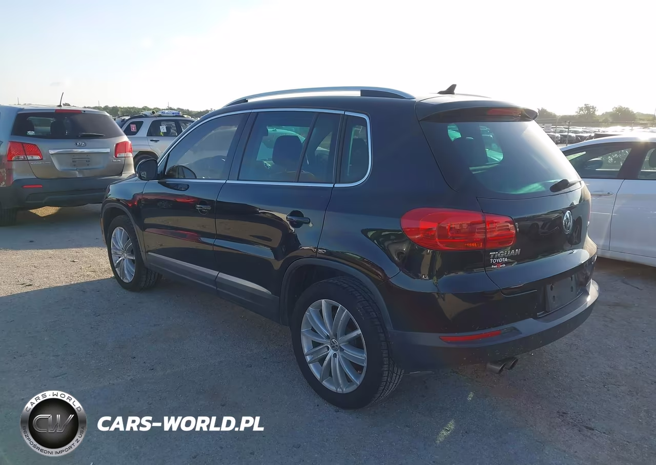 2014 Volkswagen Tiguan Sel VIN:WVGAV3AX2EW569614 - 3