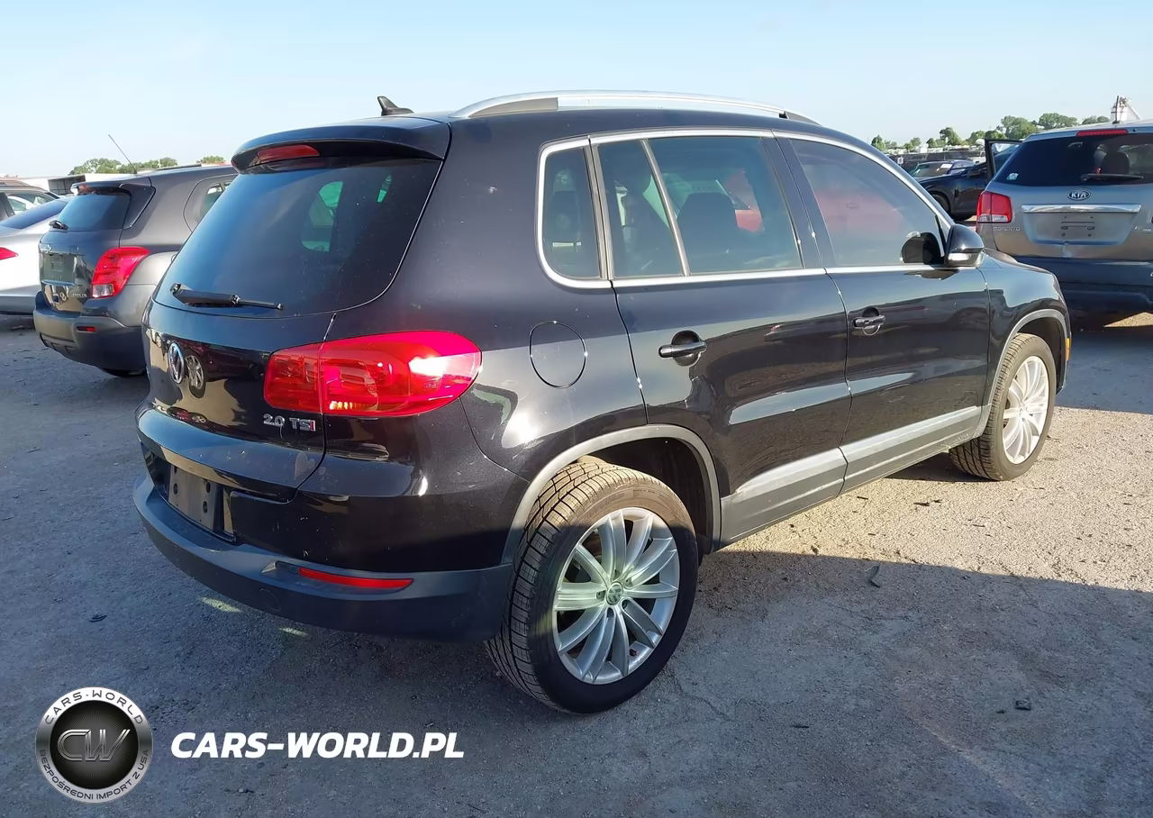 2014 Volkswagen Tiguan Sel VIN:WVGAV3AX2EW569614 - 4