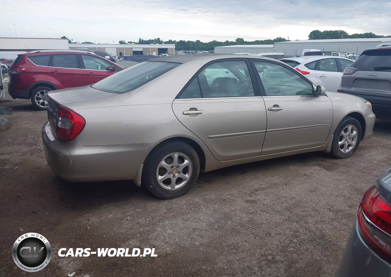 2002 Toyota Camry Le VIN:JTDBE32K120052508 - 4