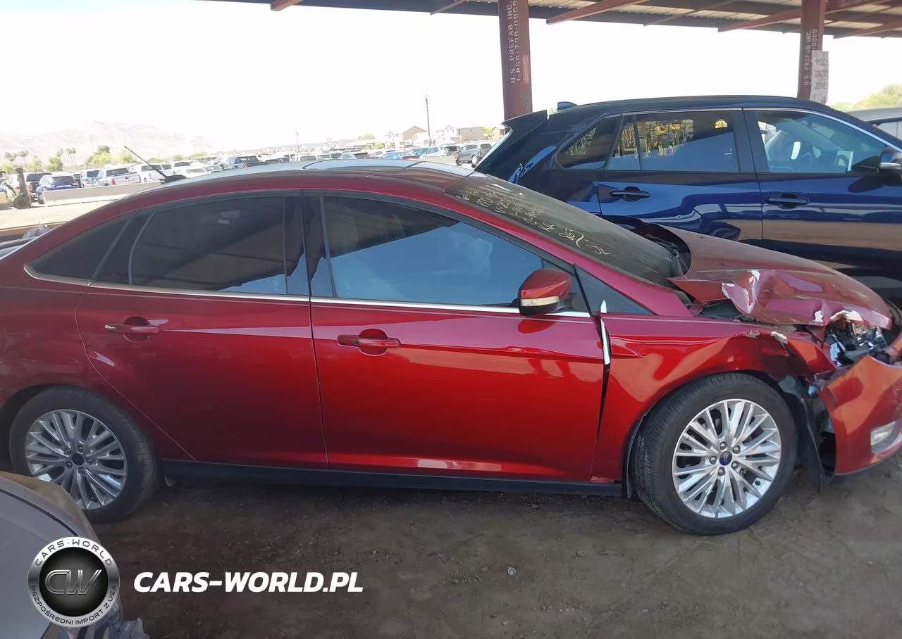 2017 Ford Focus Titanium VIN:1FADP3J25HL255113 - 13