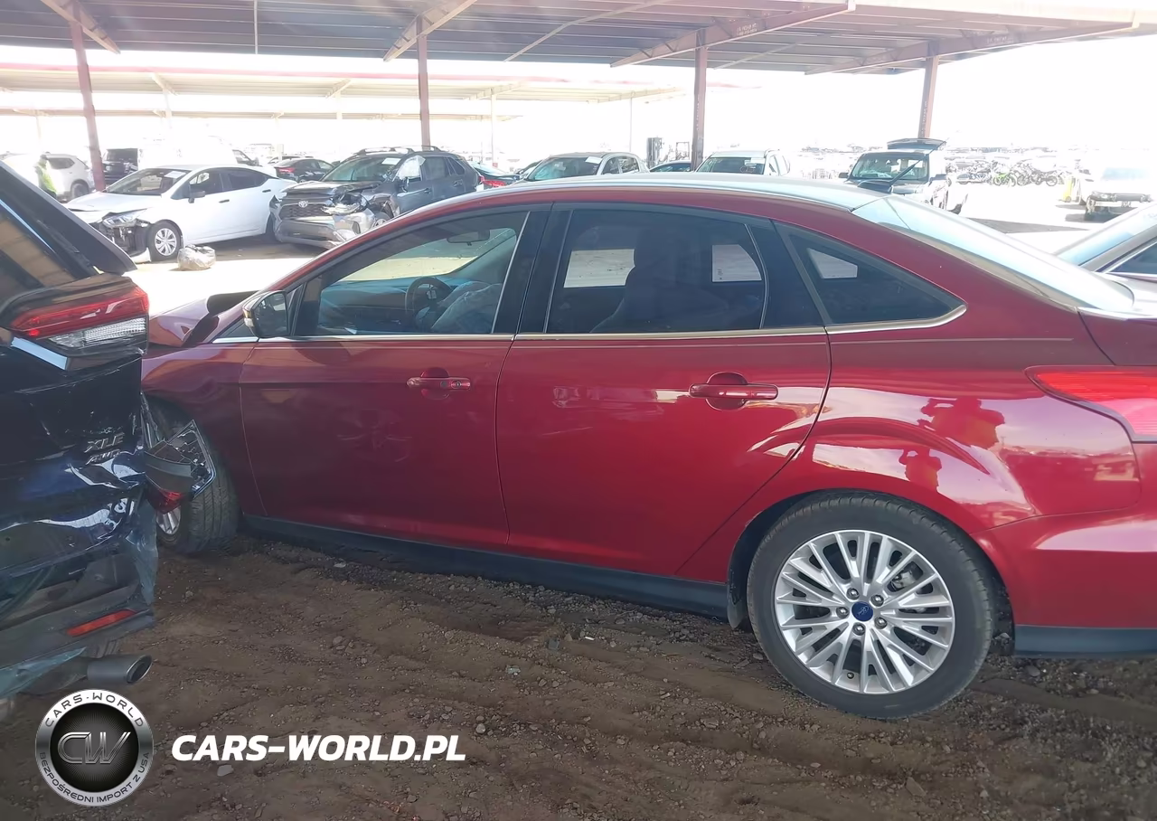 2017 Ford Focus Titanium VIN:1FADP3J25HL255113 - 14