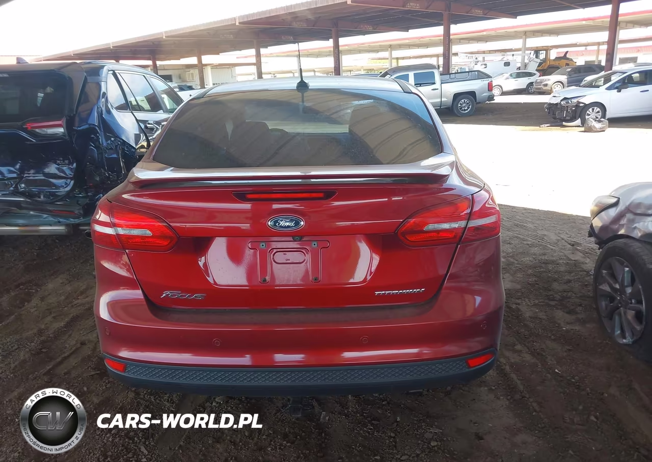 2017 Ford Focus Titanium VIN:1FADP3J25HL255113 - 16