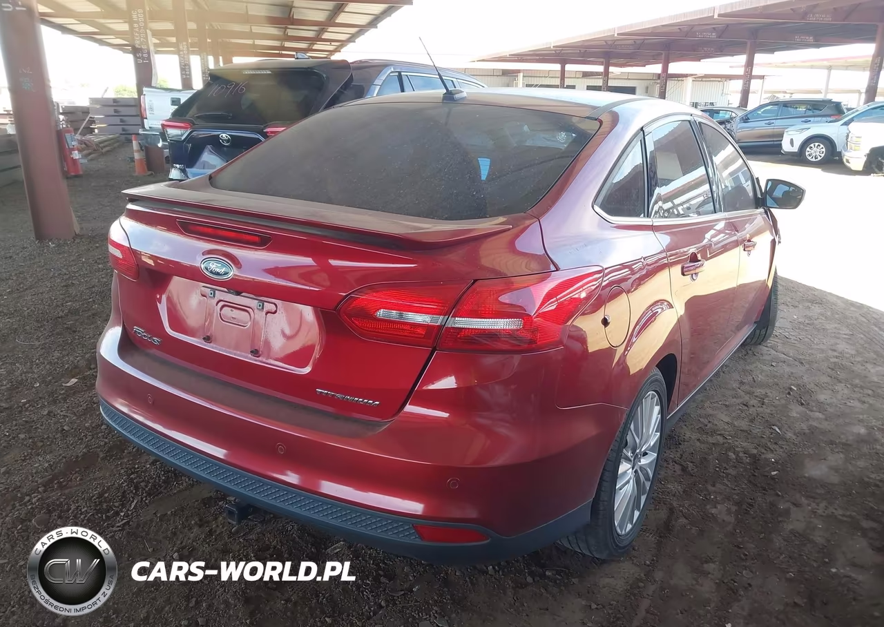 2017 Ford Focus Titanium VIN:1FADP3J25HL255113 - 4