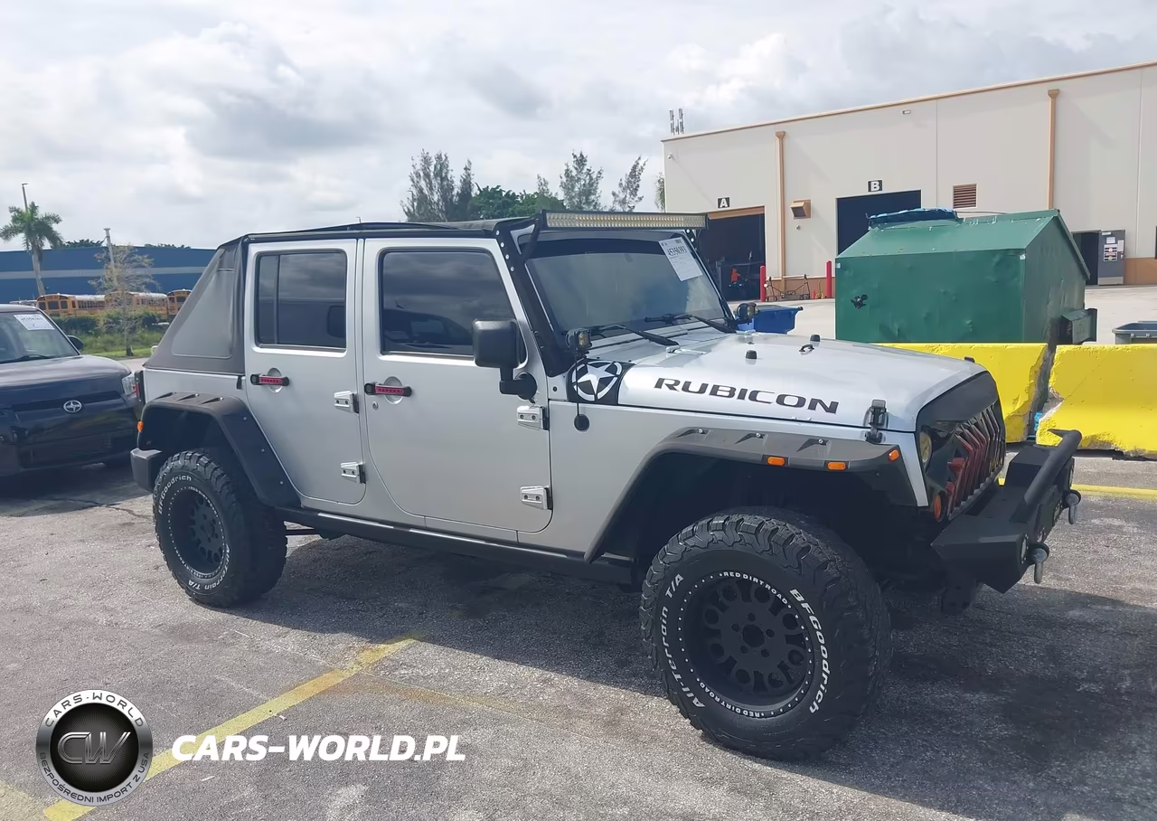 2010 Jeep Wrangler Unlimited Rubicon VIN:1J4HA6H13AL115489 - 18