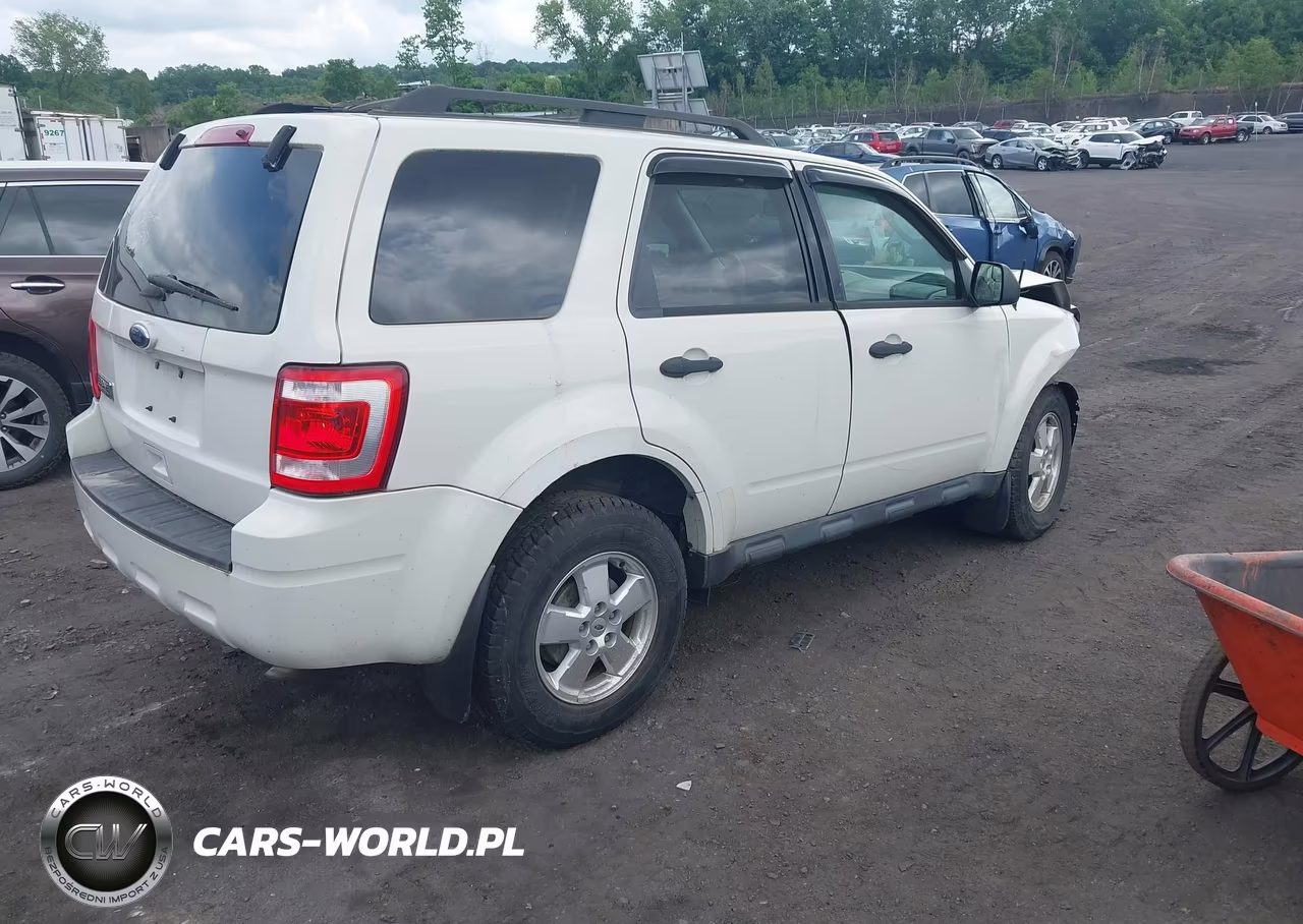 2011 Ford Escape Xlt VIN:1FMCU9D70BKB58385 - 4