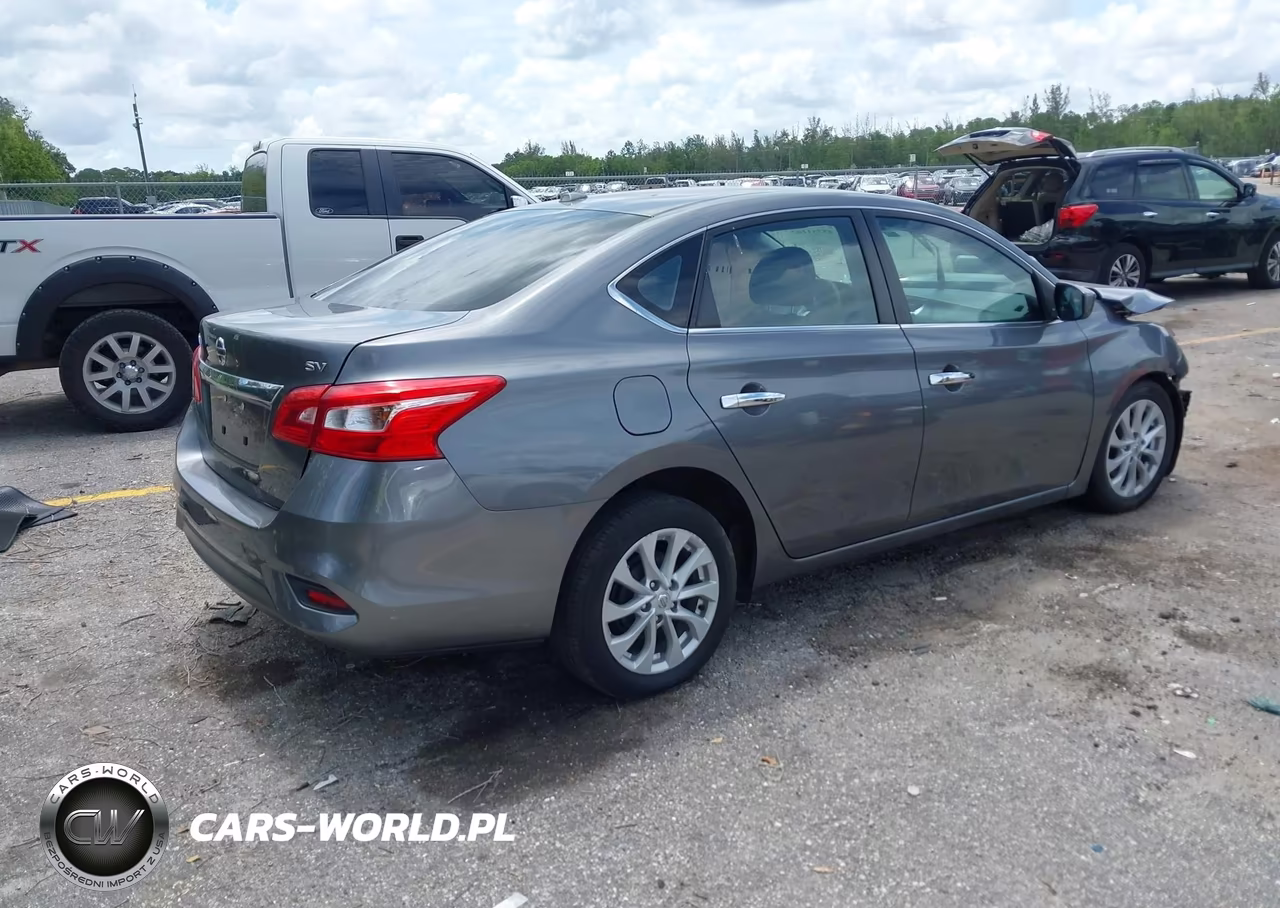 2018 Nissan Sentra Sv VIN:3N1AB7AP3JL617323 - 4