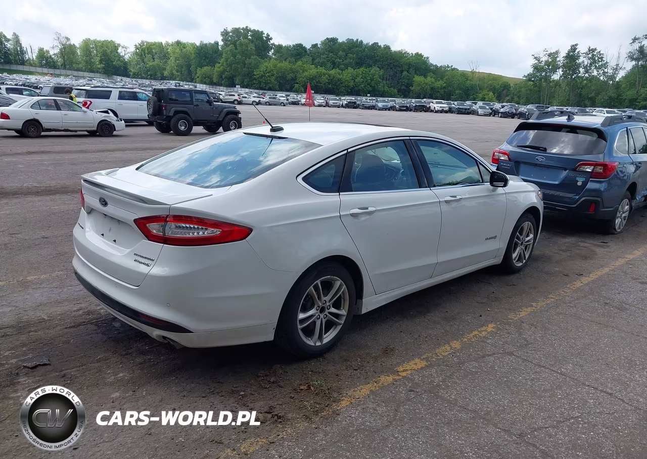 2015 Ford Fusion Hybrid Titanium VIN:3FA6P0RU8FR243405 - 4