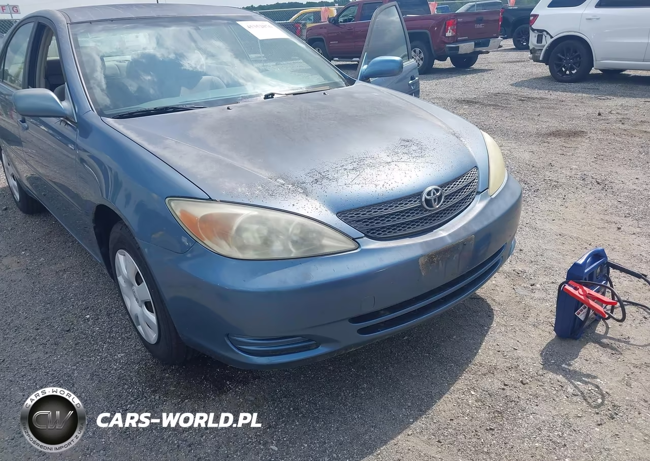 2003 Toyota Camry Le VIN:JTDBE32KX30227713 - 6