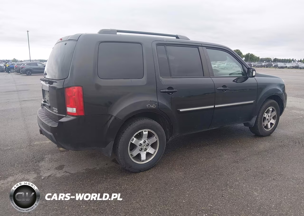 2011 Honda Pilot Touring VIN:5FNYF4H95BB011236 - 4