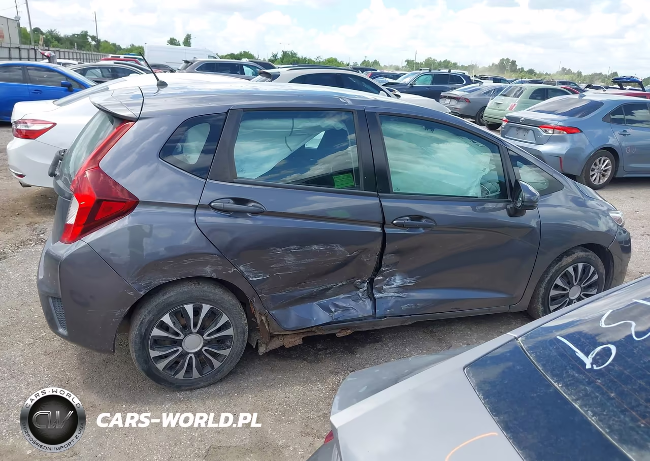 2015 Honda Fit Lx VIN:3HGGK5H50FM752522 - 13