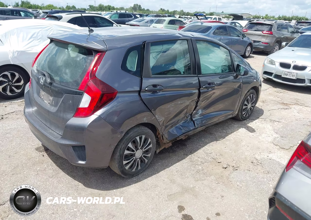 2015 Honda Fit Lx VIN:3HGGK5H50FM752522 - 4